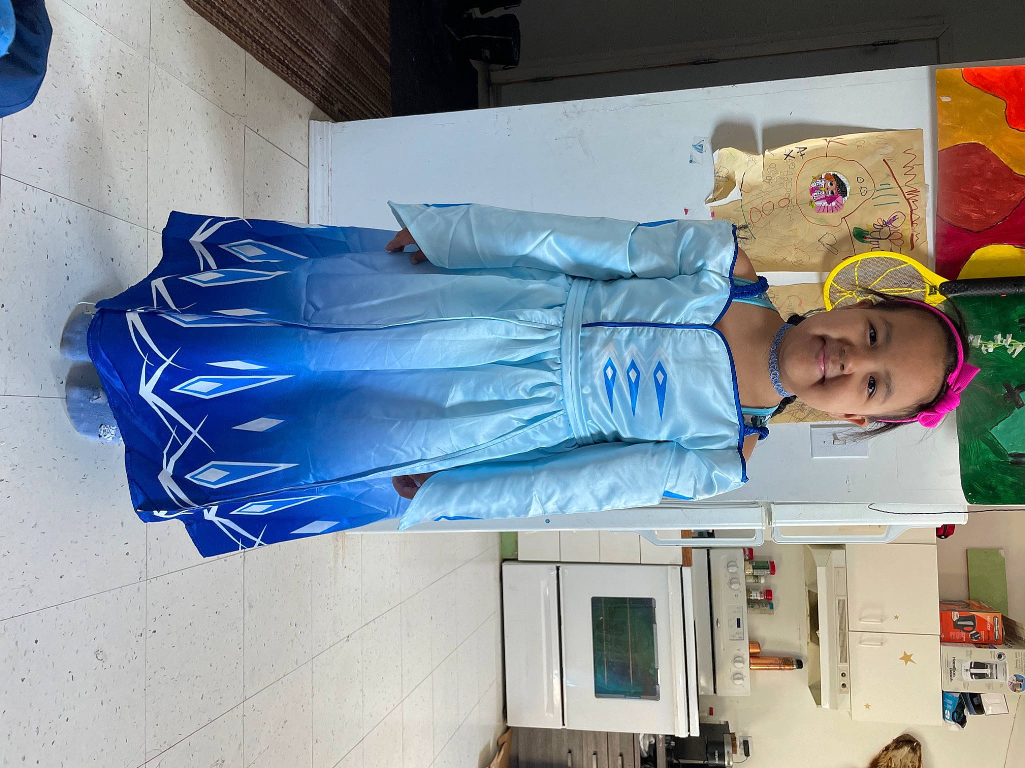 Germaine is registered to the contest to win money with this photo: art, blue, child, electric_blue, joy, machine, person, room, smile, t_shirt, toddler, visual_arts