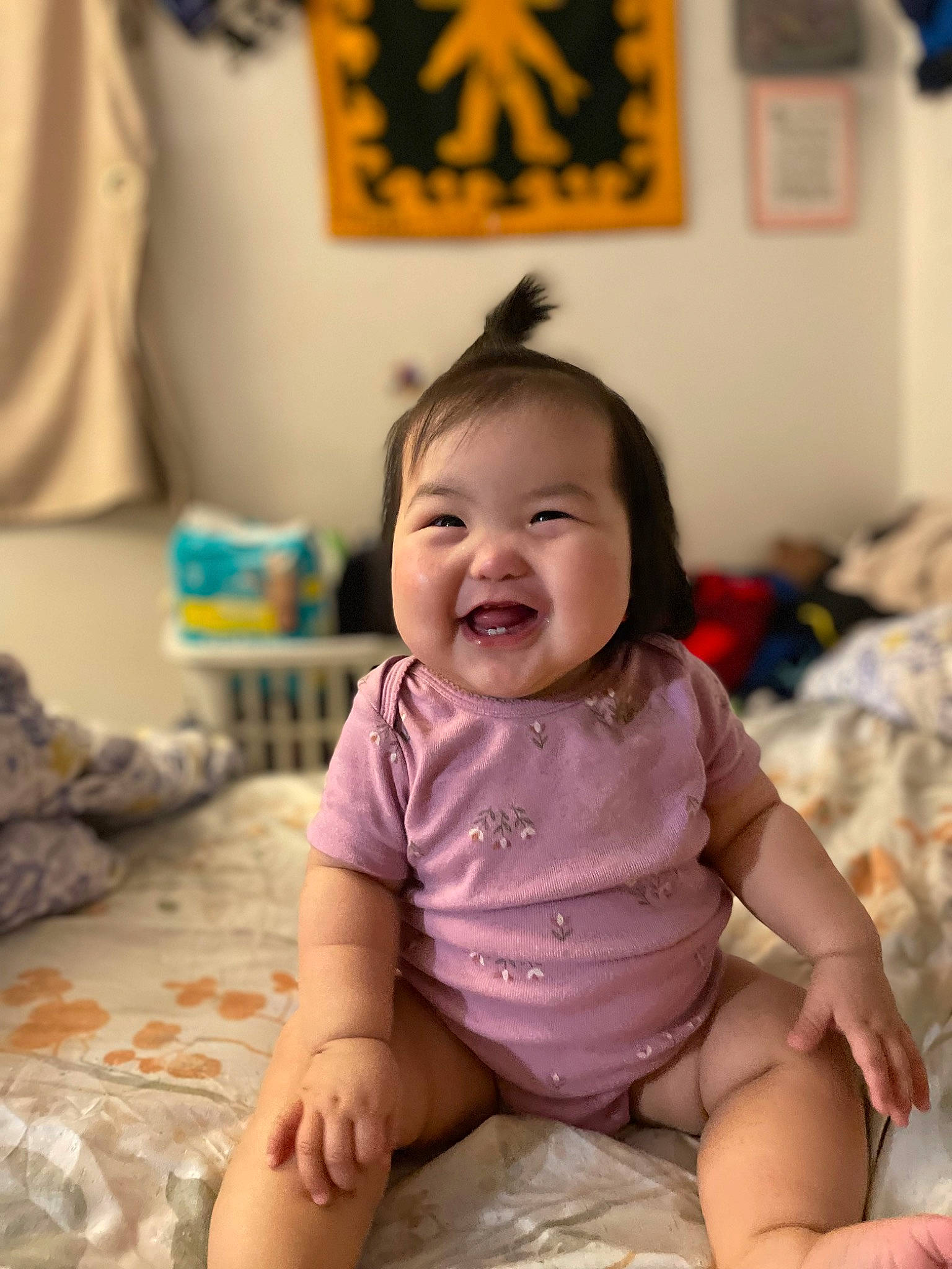 Tiara-jo is registered to the contest to win money with this photo: baby, baby_toddler_clothing, cheek, chin, comfort, eye, happy, head, iris, joy, mouth, person, photograph, picture_frame, product, purple, skin, sleeve, smile, standing