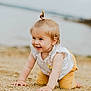 Chloé a rejoint le concours — aidez-le/la à gagner de superbes lots ! baby, child, crawling, sand, beach, smiling, blond_hair, blue_eyes, white_top, yellow_pants, outdoor, water, nature, portrait, cute, happy, infant, toddler, person, sunny