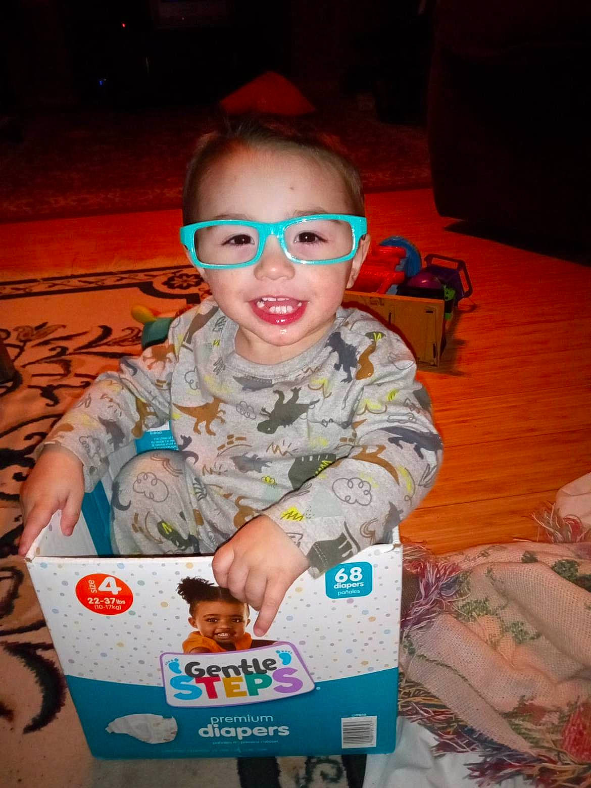 Kash joined the competition — help win amazing prizes! baby, baby_toddler_clothing, child, eyewear, fun, happy, joy, military, military_camouflage, military_person, person, personal_protective_equipment, play, room, sitting, smile, soldier, t_shirt, toddler