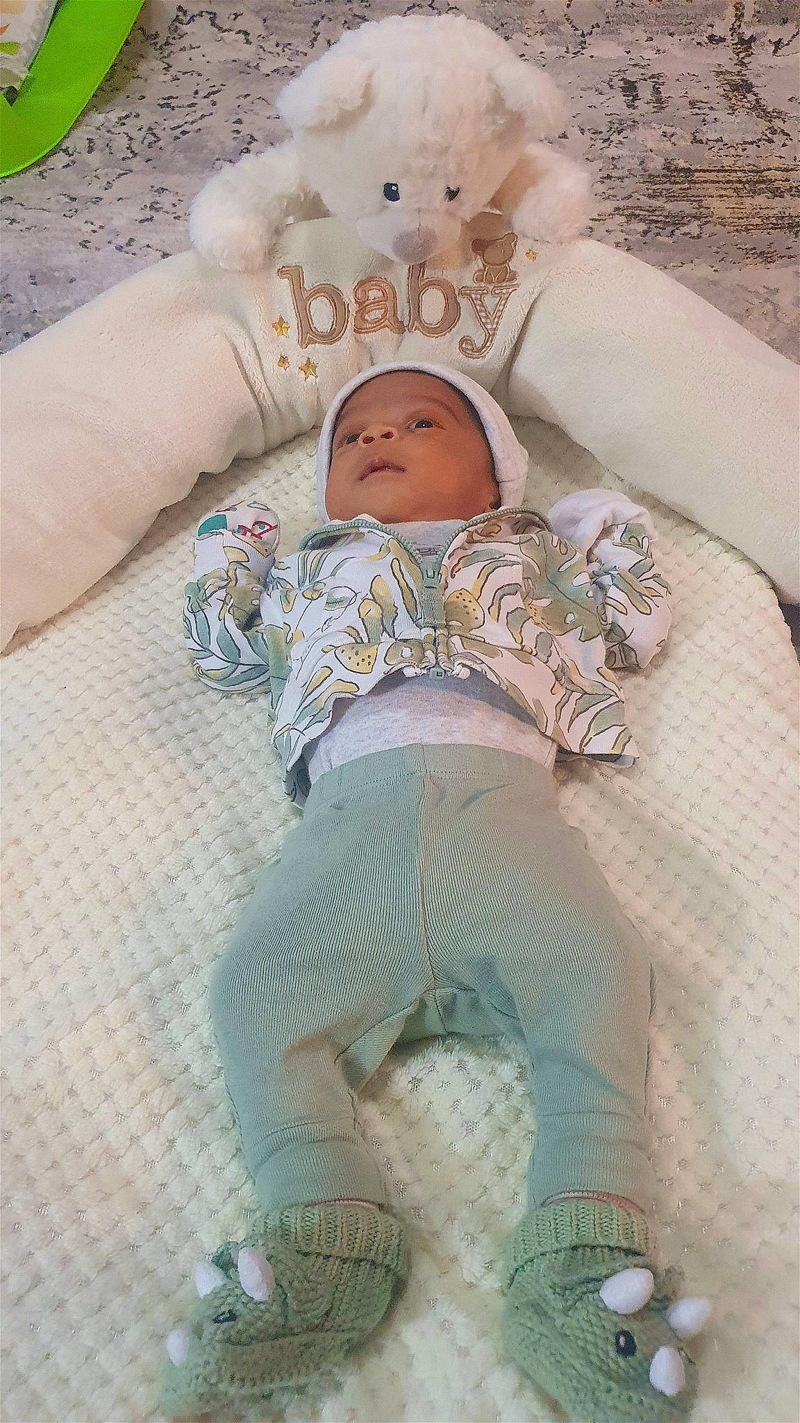 Amogh is registered to the contest to win money with this photo: baby, baby_products, baby_safety, baby_sleeping, baby_toddler_clothing, bed_sheet, bedding, bedtime, cheek, child, comfort, linens, pattern, person, room, sitting, skin, sleeve, sock, textile