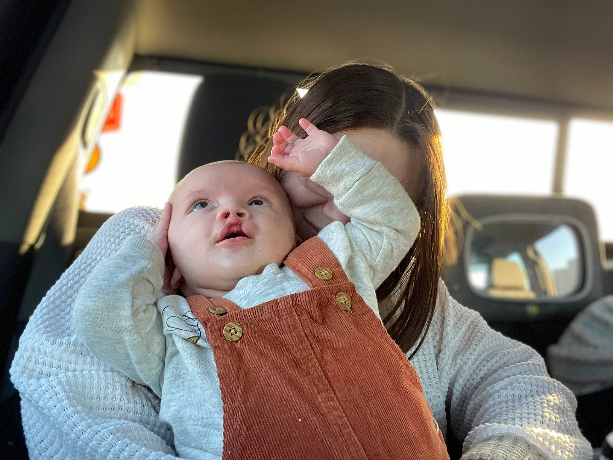 Phillip is registered to the contest to win money with this photo: auto_part, automotive_design, baby, baby_products, baby_toddler_clothing, cheek, child, comfort, family_car, flash_photography, fun, gesture, hairstyle, happy, luxury_vehicle, nose, person, personal_luxury_car, portrait_photography, sitting