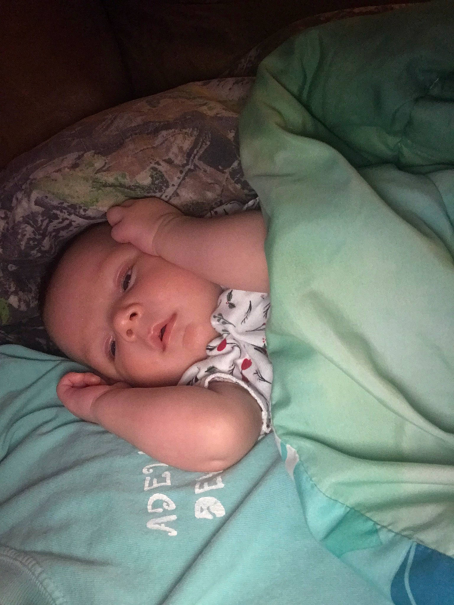 Adeline is registered to the contest to win money with this photo: baby, baby_toddler_clothing, bedtime, brown, cheek, child, comfort, darkness, eyebrow, flash_photography, iris, linens, mouth, nap, nose, person, room, skin, sleep, sleeve