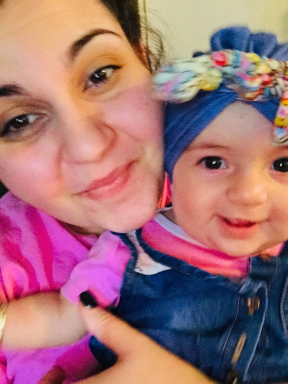 Brexley is registered to the contest to win money with this photo: beauty, cheek, child, day, eye, eyebrow, face, forehead, girl, hair_accessory, head, headgear, headwear, human_hair_color, infant, nose, person, pink, purple, skin