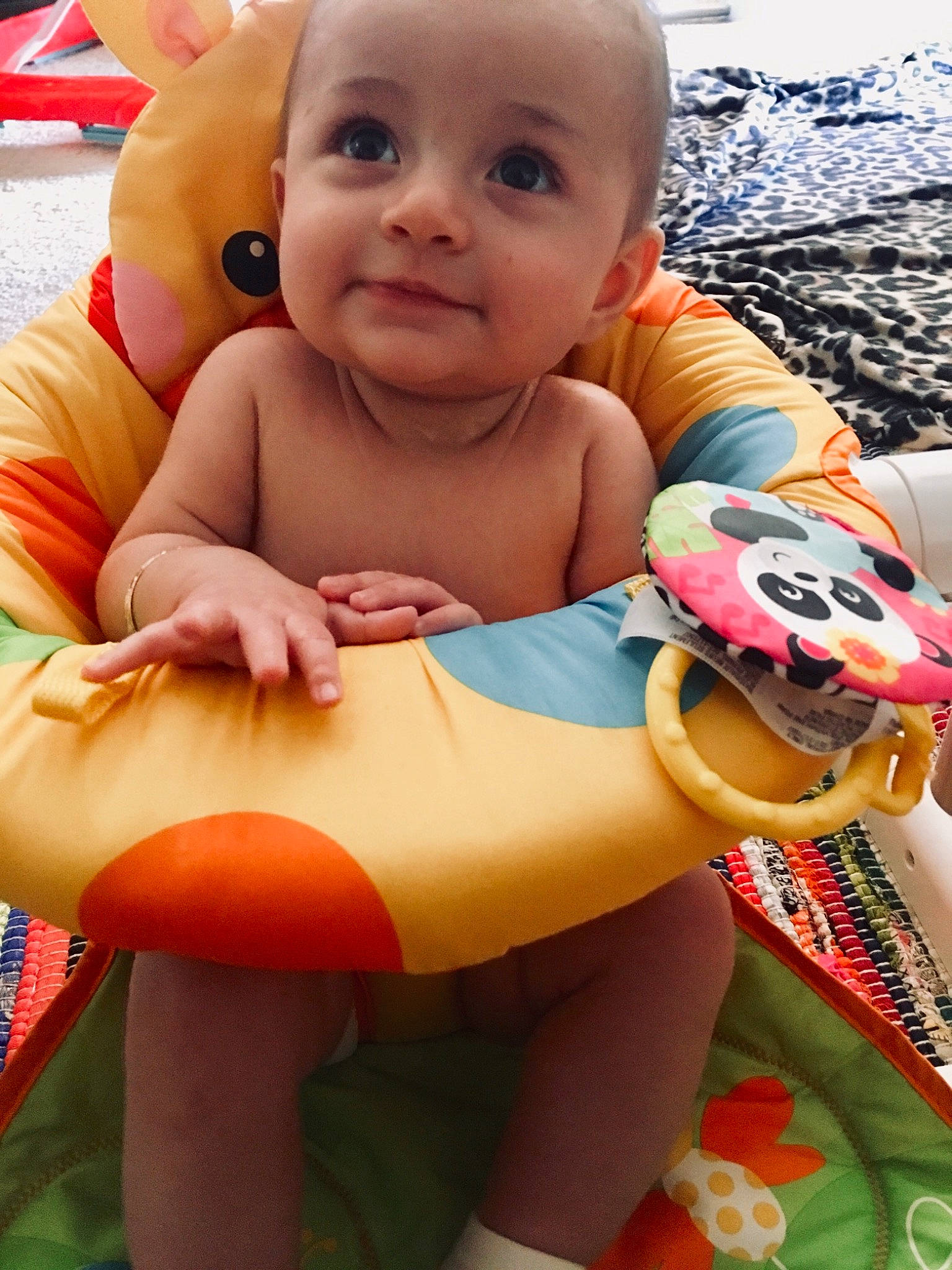 Brexley is registered to the contest to win money with this photo: abdomen, baby_products, cheek, child, finger, fun, infant, person, play, product, sitting, skin, smile, toddler, toy