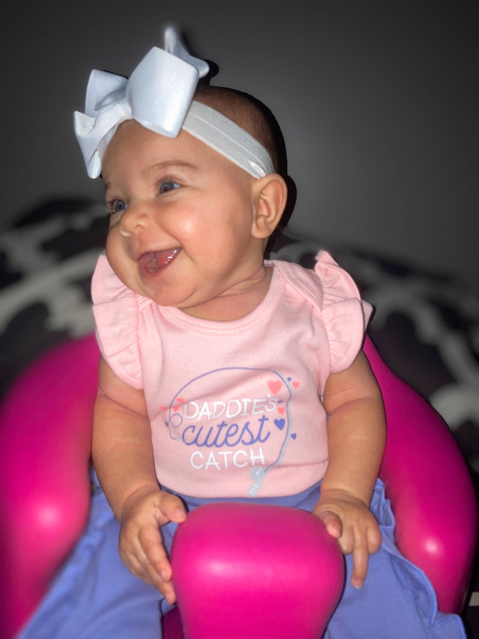 Kenleigh joined the competition — help win amazing prizes! baby, baby_toddler_clothing, balloon, cap, cheek, eye, face, facial_expression, finger, flash_photography, fun, happy, headwear, light, organ, person, pink, skin, sleeve, smile