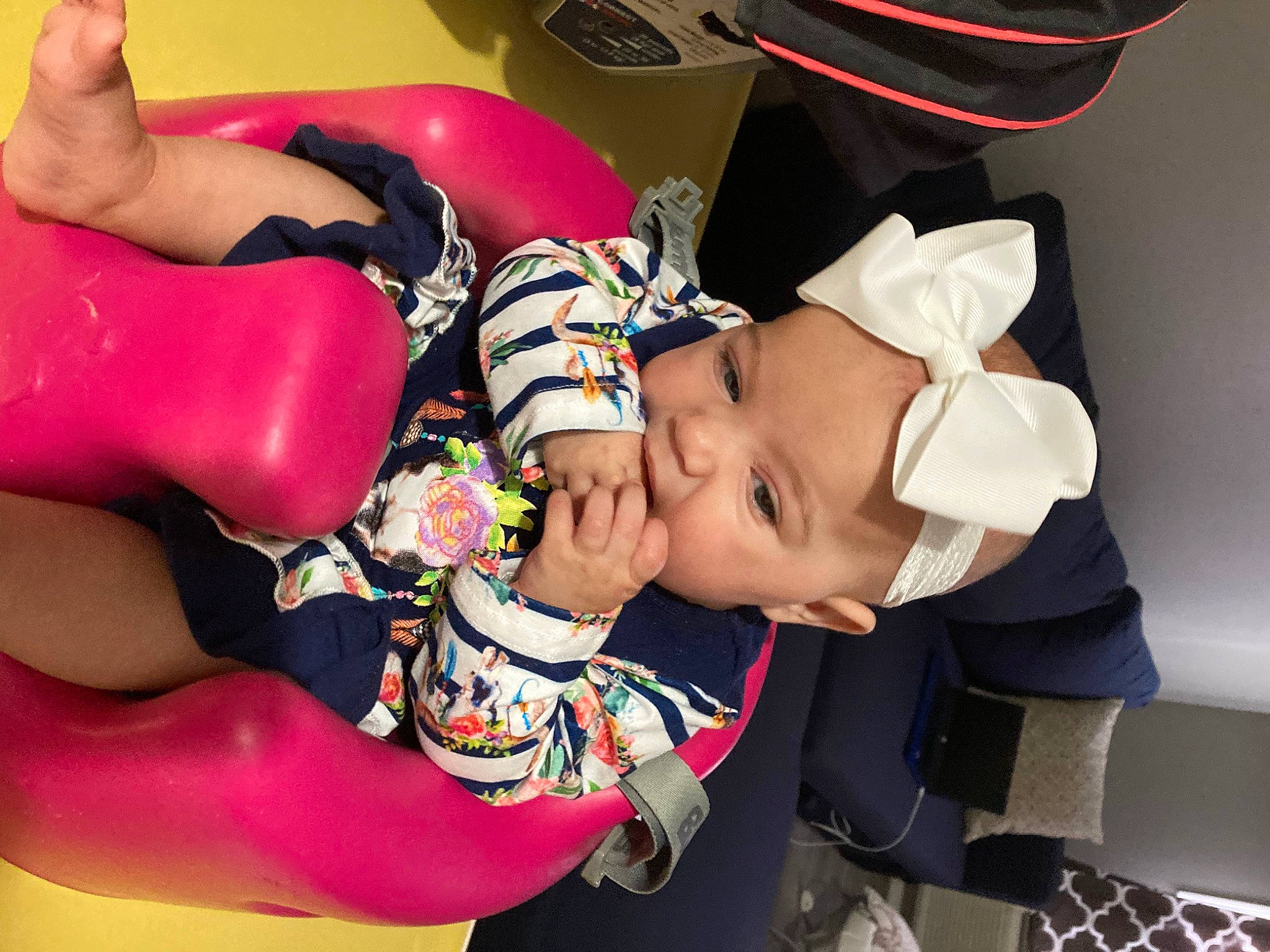 Kenleigh is registered to the contest to win money with this photo: baby, baby_products, child, comfort, event, eyewear, fashion_accessory, fun, happy, hat, headwear, human_leg, leg, leisure, nail, pattern, person, recreation, room, sun_hat