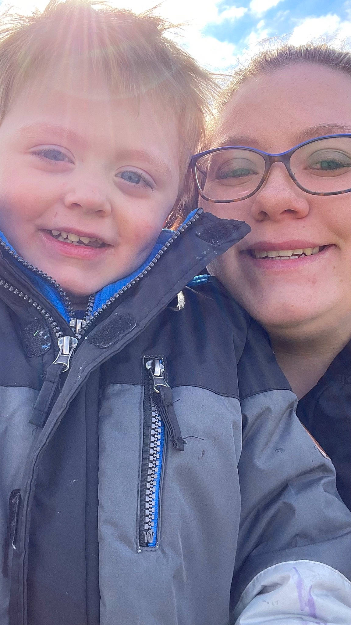 Aiden is registered to the contest to win money with this photo: cheek, chin, cool, eye, eyebrow, eyewear, fun, gesture, glasses, happy, human, iris, joy, lip, nose, outerwear, person, skin, sleeve, smile