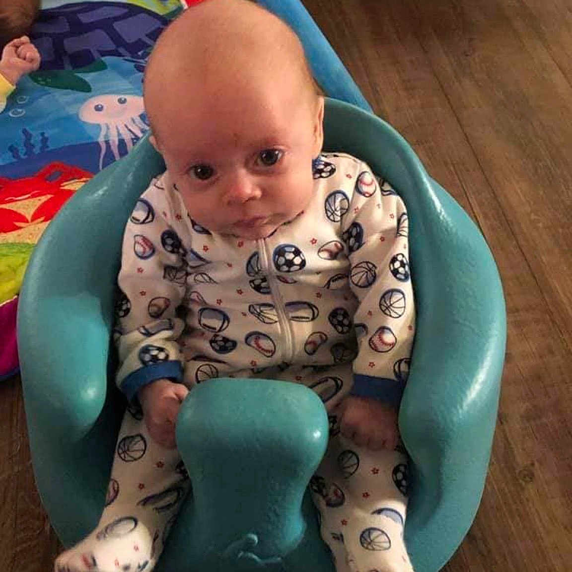 Kayden is registered to the contest to win money with this photo: baby, baby_products, baby_toys, child, fun, person, play, product, sitting, toddler, toy, tummy_time