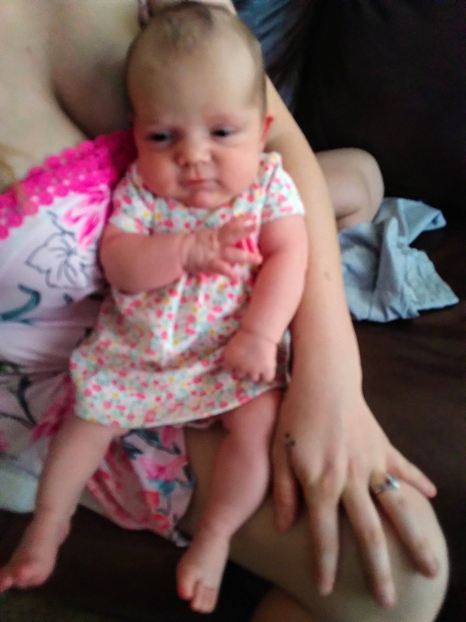 Salarah is registered to the contest to win money with this photo: baby, baby_toddler_clothing, cheek, child, finger, hand, leg, person, pink, sitting, skin, smile, toddler