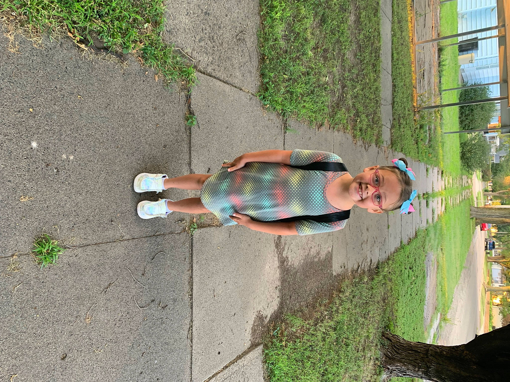 Tessa joined the competition — help win amazing prizes! asphalt, child, concrete, fun, grass, human_leg, joy, leaf, leisure, pedestrian, people_in_nature, person, plant, road_surface, shadow, sidewalk, soil, thigh, tree, walking_shoe