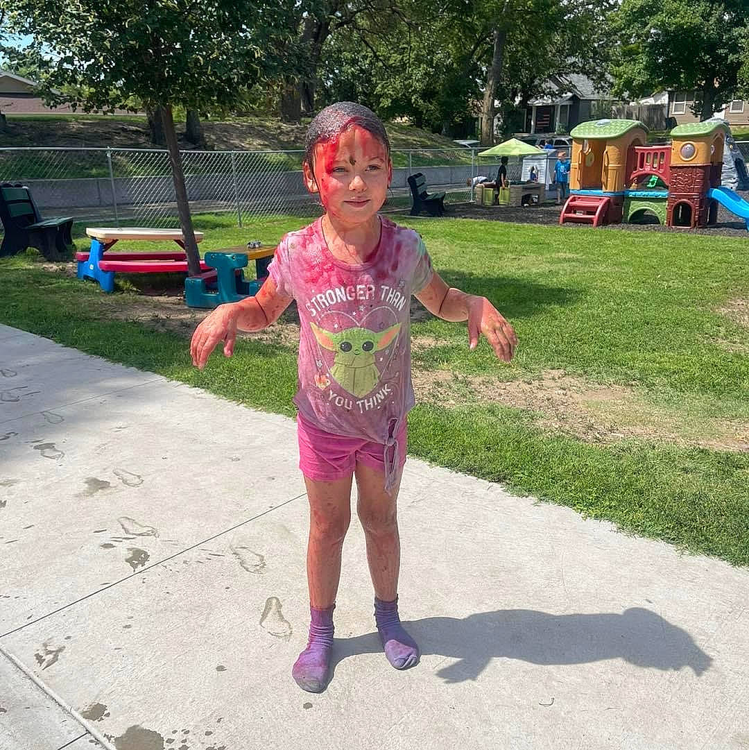 Tessa joined the competition — help win amazing prizes! asphalt, barefoot, child, city, foot, fun, garden, grass, happy, headwear, leisure, magenta, party_supply, person, pink, play, recreation, summer, t_shirt, toddler
