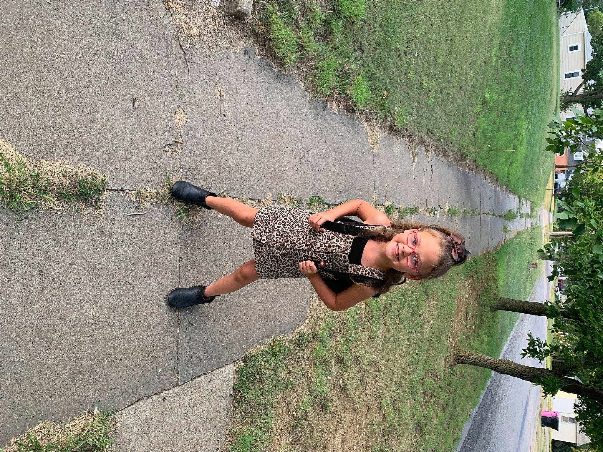 Tessa joined the competition — help win amazing prizes! asphalt, dress, fun, grass, human_leg, joy, landscape, leisure, people_in_nature, person, plant, recreation, reflection, road, road_surface, shadow, sidewalk, spring, sunglasses, thigh