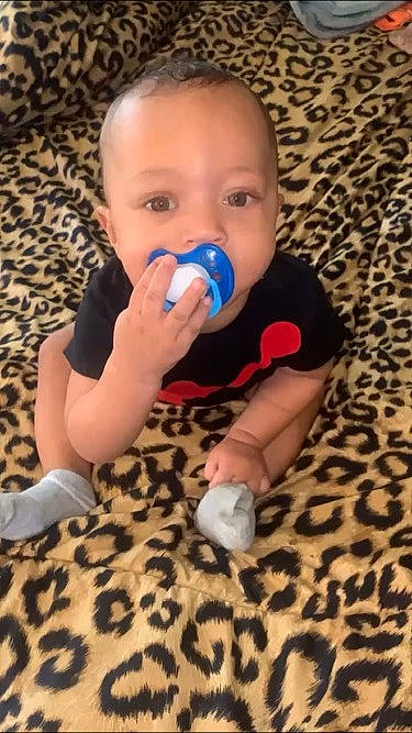 Jamir joined the competition — help win amazing prizes! baby, baby_toddler_clothing, cheek, child, comfort, ear, finger, floor, flooring, foot, fun, hand, hardwood, mouth, nail, nose, person, skin, thumb, toddler