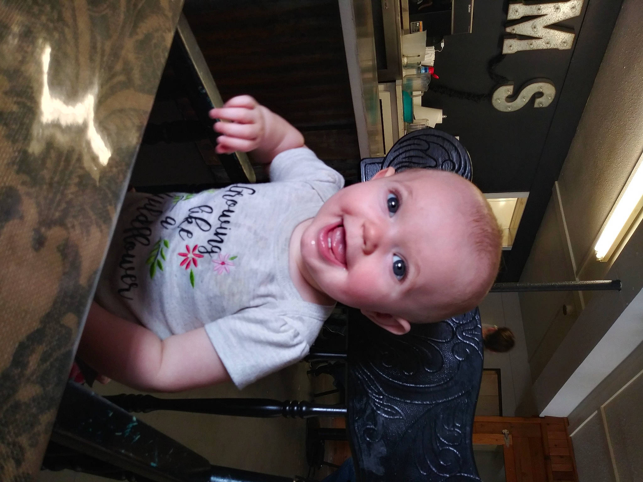 Amelia is registered to the contest to win money with this photo: baby, baby_laughing, baby_products, baby_toddler_clothing, cheek, child, cool, flash_photography, fun, gesture, happy, joy, mouth, person, room, sitting, smile, t_shirt, toddler