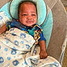 Semaj joined the competition — help win amazing prizes! baby, blanket, blue, pacifier, seat, child, smiling, infant, cozy, clothing, fabric, comfort, indoor, cute, portrait, resting, baby_seat, furniture, person, soft