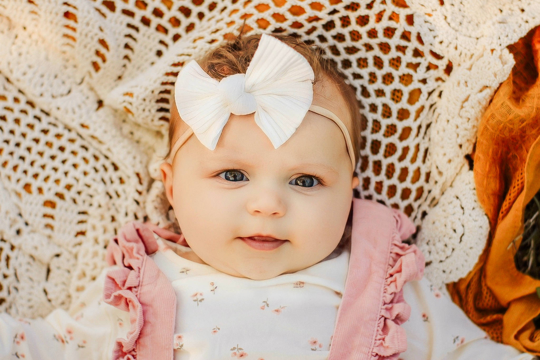 Lennon joined the competition — help win amazing prizes! baby, baby_toddler_clothing, cheek, collar, eye, happy, head, headgear, headpiece, headwear, iris, lip, outerwear, pattern, person, pink, skin, sleeve, smile, textile