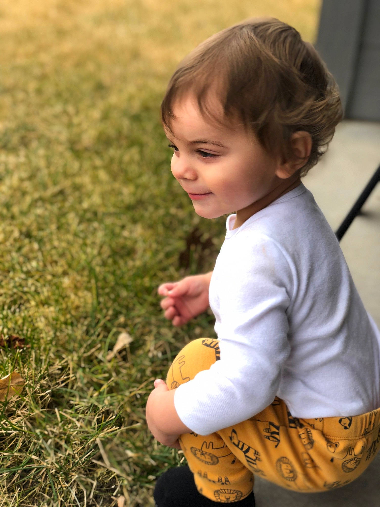 Kannon is registered to the contest to win money with this photo: baby, baby_toddler_clothing, child, facial_expression, flooring, fun, grass, grassland, happy, people_in_nature, person, plant, play, sitting, skin, sleeve, smile, soil, t_shirt, toddler