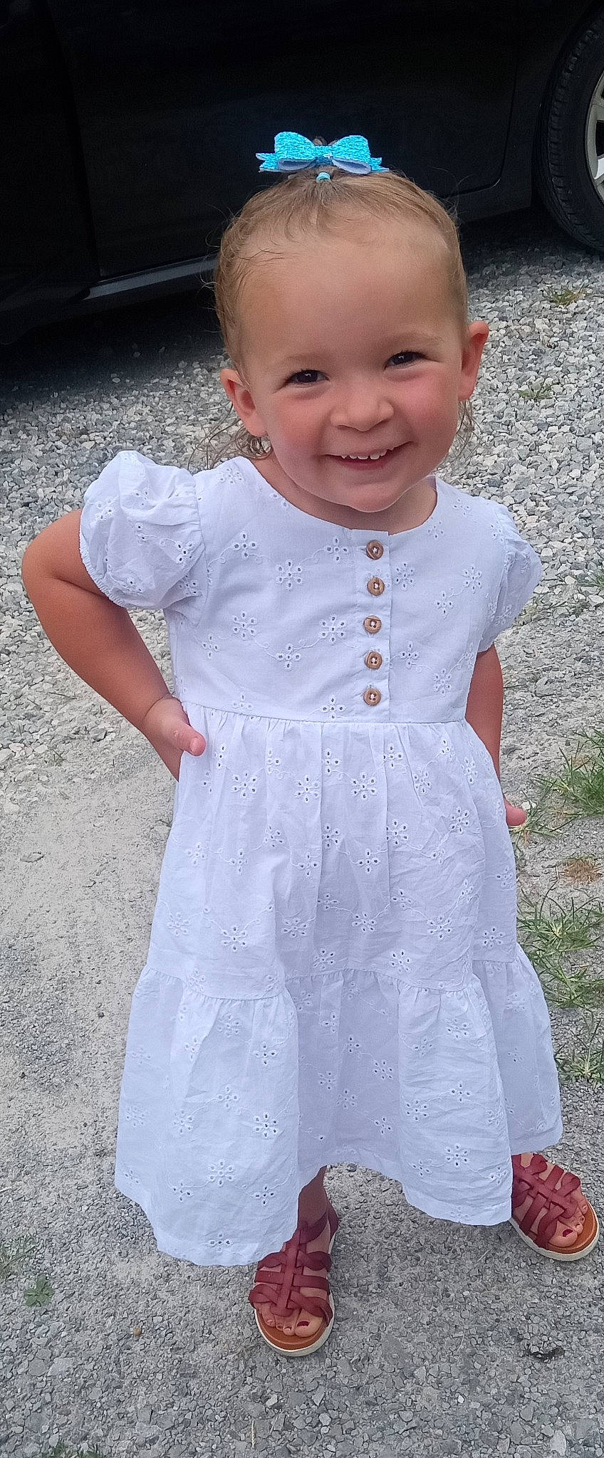 Jenna joined the competition — help win amazing prizes! baby, baby_toddler_clothing, child, day_dress, dress, embellishment, facial_expression, gesture, grass, happy, head, joy, lip, one_piece_garment, pattern, person, pink, skin, sleeve, smile