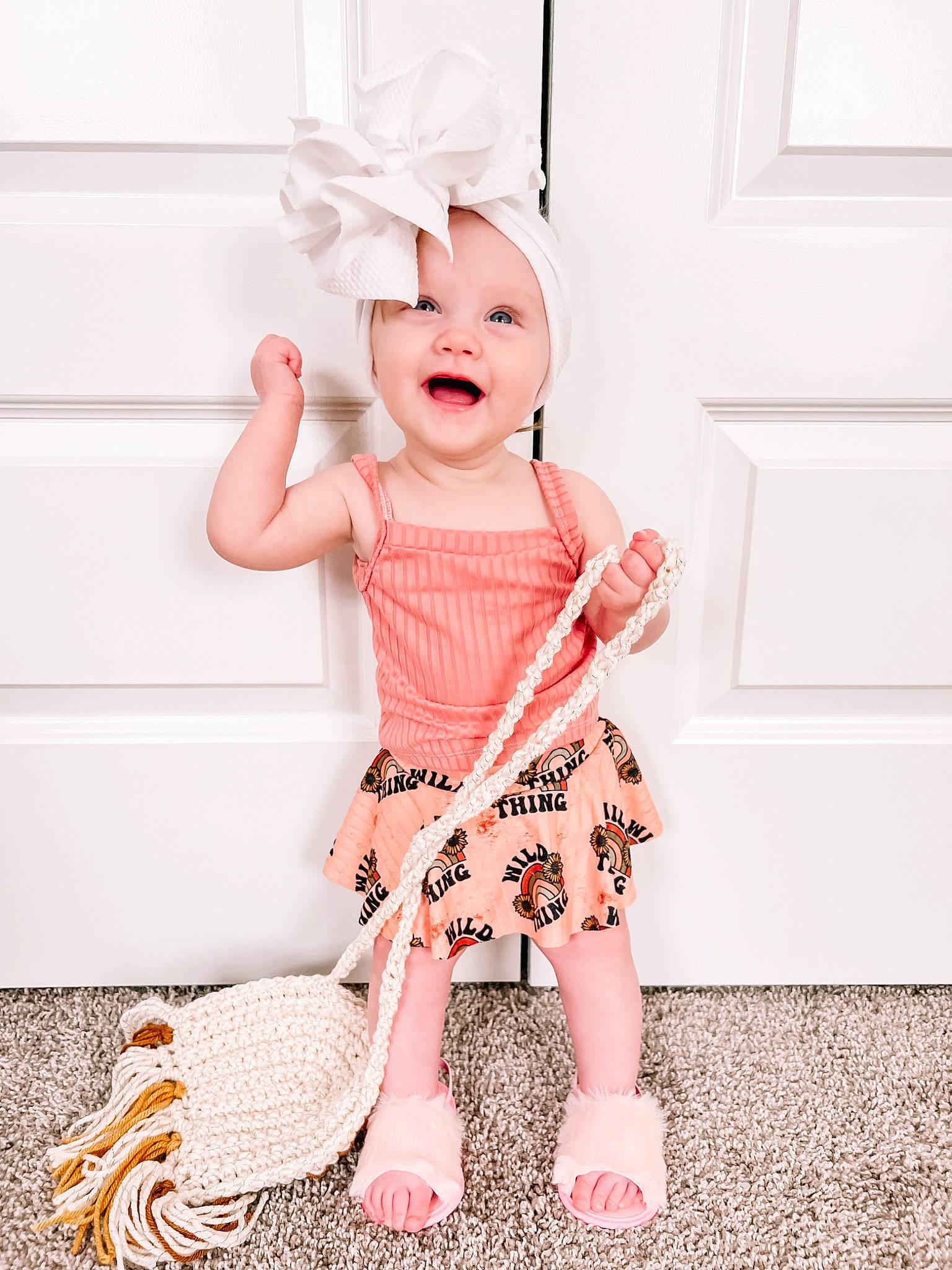 Elaina joined the competition — help win amazing prizes! arm, baby_toddler_clothing, clothing, day_dress, dress, fawn, font, hand, happy, hat, headwear, pattern, peach, person, pink, shoulder, skin, sleeve, smile, t_shirt
