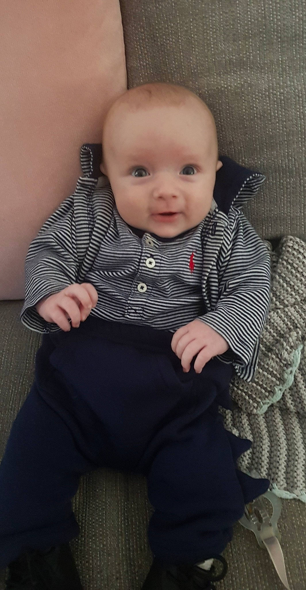 Kyzer is registered to the contest to win money with this photo: baby, baby_toddler_clothing, cheek, child, chin, collar, comfort, dress_shirt, flash_photography, grey, iris, lip, outerwear, pattern, person, sitting, skin, sleeve, smile, standing