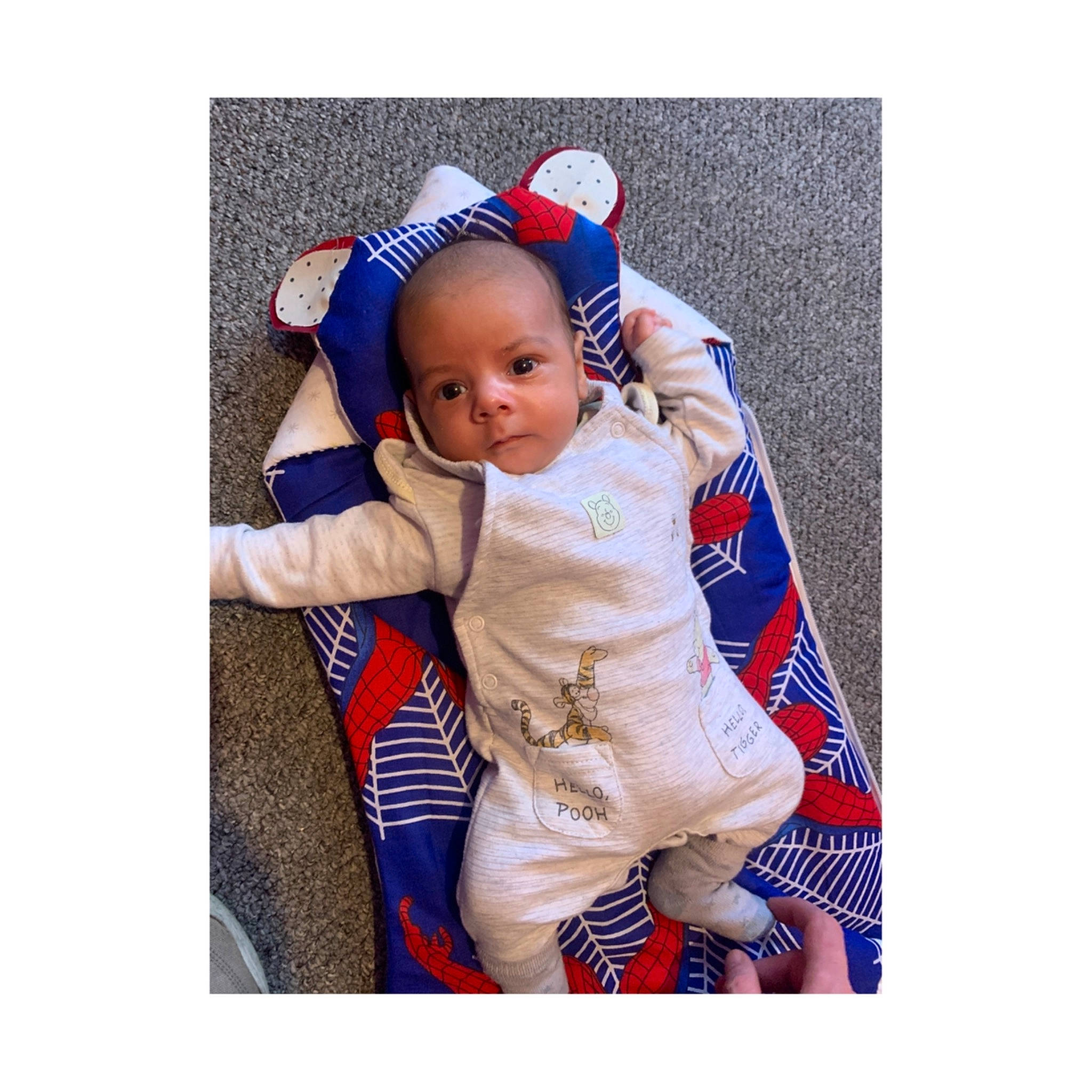 Khalil is registered to the contest to win money with this photo: baby, baby_products, baby_sleeping, baby_toddler_clothing, cap, child, clothing, electric_blue, face, fashion_accessory, font, gesture, happy, head, outerwear, pattern, person, product, sleeve, toddler