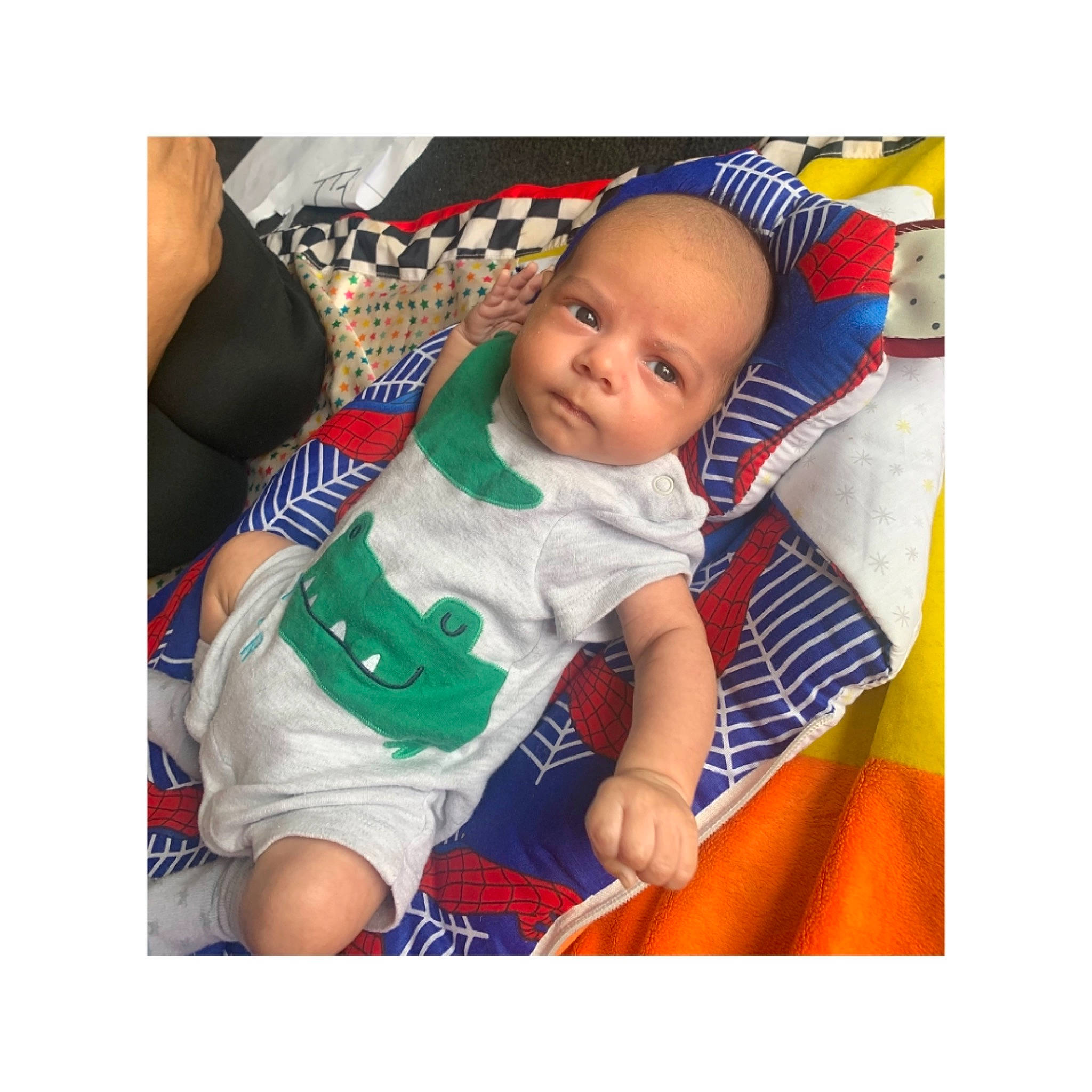 Khalil joined the competition — help win amazing prizes! baby, baby_sleeping, baby_toddler_clothing, child, comfort, electric_blue, font, happy, jersey, linens, outerwear, person, product, shirt, shorts, sitting, sleeve, sportswear, t_shirt, textile