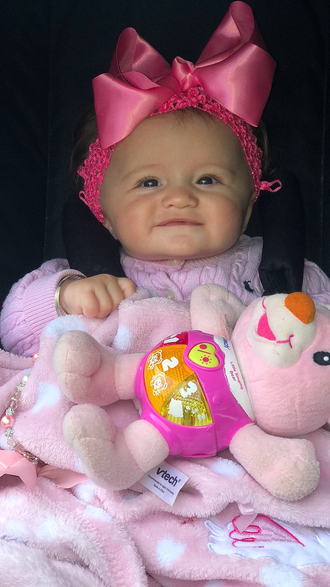 Lilly-rose is registered to the contest to win money with this photo: baby, baby_toddler_clothing, cheek, child, doll, face, head, person, pink, plush, skin, smile, stuffed_toy, toddler, toy