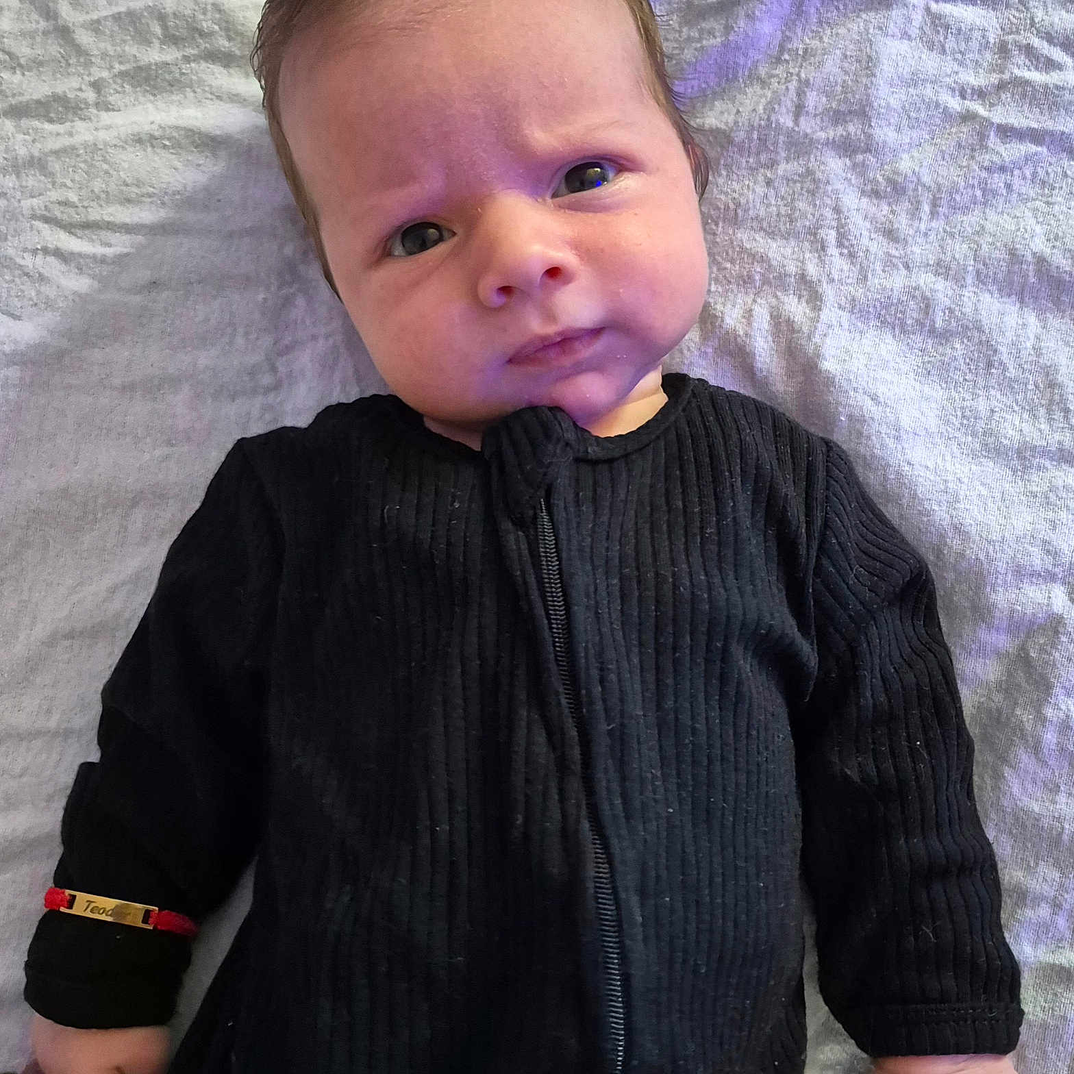 Teodor is registered to the contest to win money with this photo: baby, bodypart, clothing, coat, face, finger, hand, happy, head, jacket, knitwear, longsleeve, pants, person, photography, portrait, shirt, sleeve, smile, sweater