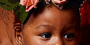 Samani joined the competition — help win amazing prizes! baby, child, portrait, curly_hair, flower_crown, pink_flowers, earrings, close_up, face, skin, infant, cute, adorable, young_child, headshot, expression, cute_face, fashion_accessory, natural_light, soft_lighting