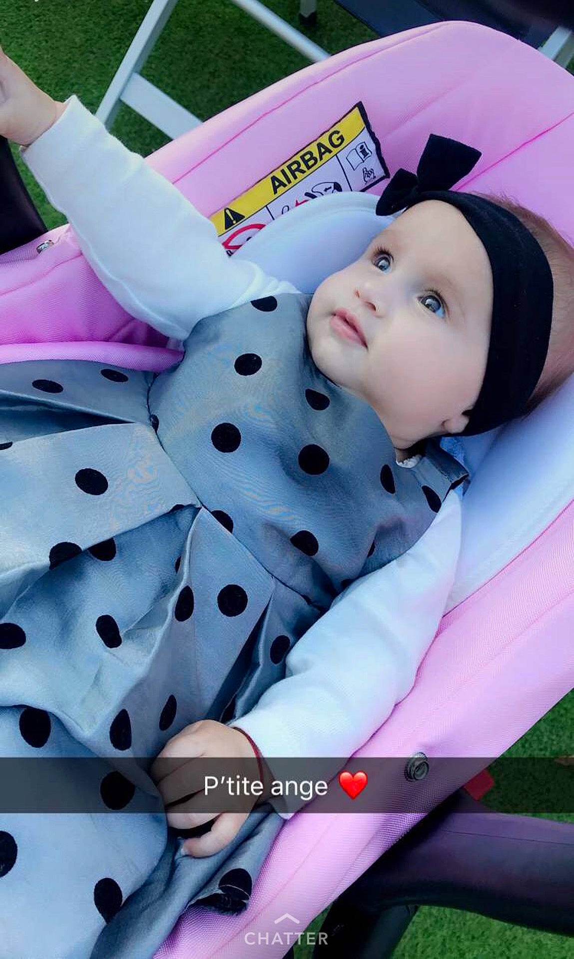 Shelsea a rejoint le concours — aidez-le/la à gagner de superbes lots ! black_hair, car_seat, child, costume, girl, infant, person, pink, product, smile, toddler