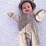 Juni joined the competition — help win amazing prizes! baby, child, smiling, snow, winter_clothing, onesie, fuzzy_suit, hood, mittens, footwear, outdoor, cold_weather, cute, happy, lying_down, infant, animal_ears, playful, portrait, cozy
