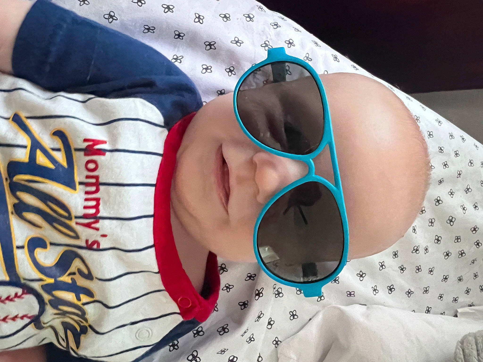 Colson is registered to the contest to win money with this photo: carmine, circle, comfort, eyelash, eyewear, fashion_accessory, fun, glasses, goggles, hat, headgear, linens, nail, pattern, person, personal_protective_equipment, sun_hat, sunglasses, thigh, vision_care