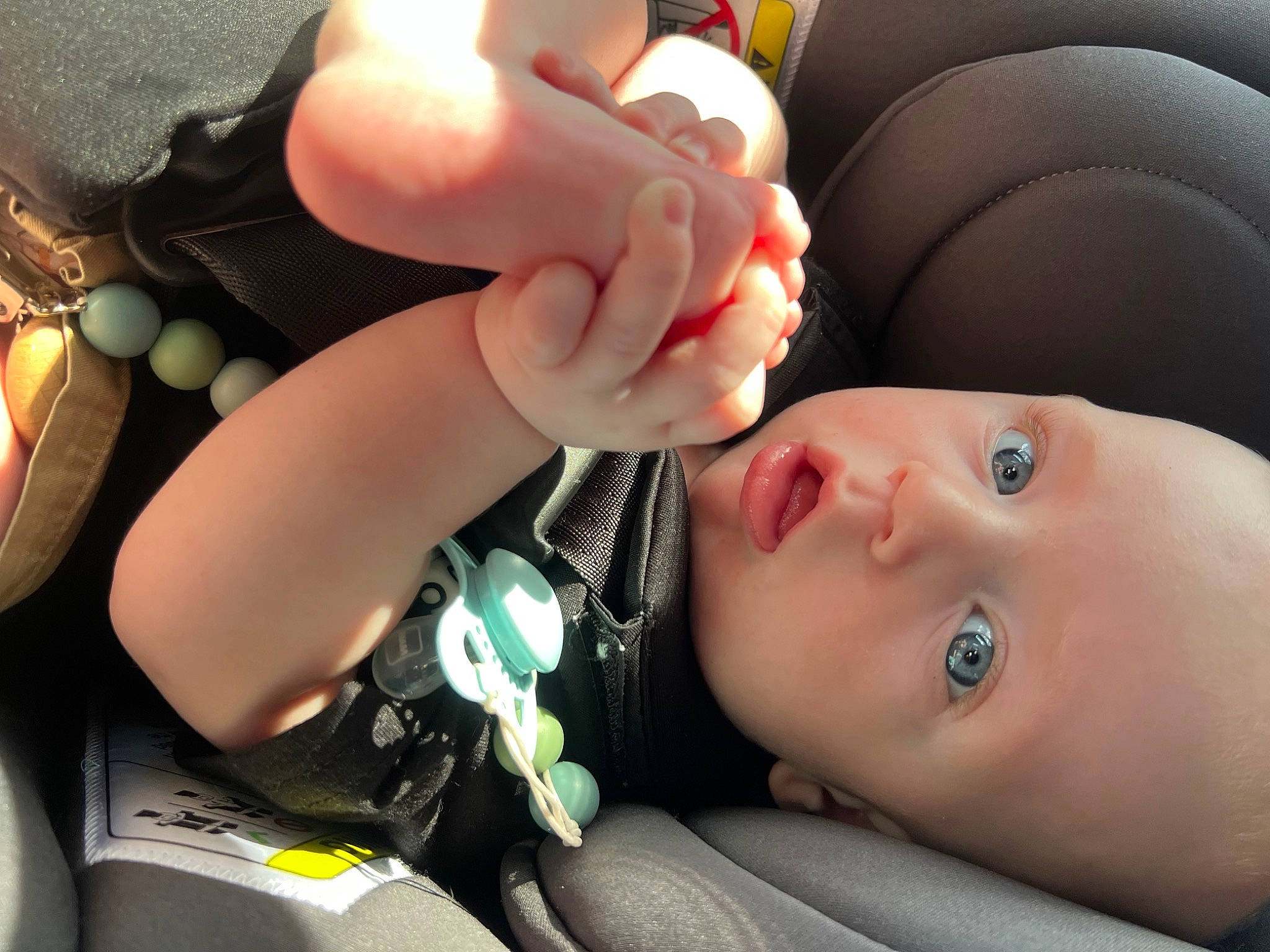 Colson joined the competition — help win amazing prizes! baby, black_hair, cheek, eye, eyelash, facial_expression, finger, gesture, hand, headgear, human_body, mouth, muscle, nail, nose, person, skin, surprise, thigh, thumb