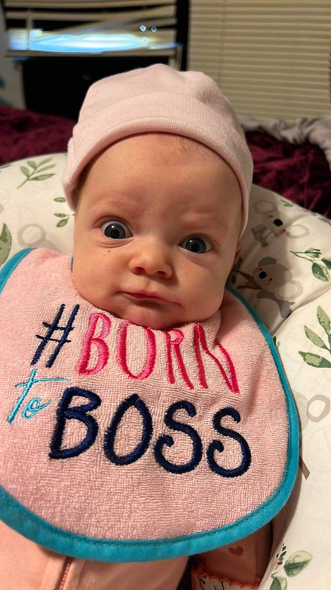 Emilia is registered to the contest to win money with this photo: baby, baby_products, baby_toddler_clothing, cheek, child, chin, event, eyebrow, eyelash, face, facial_expression, happy, headgear, linens, lip, nose, person, pink, skin, smile