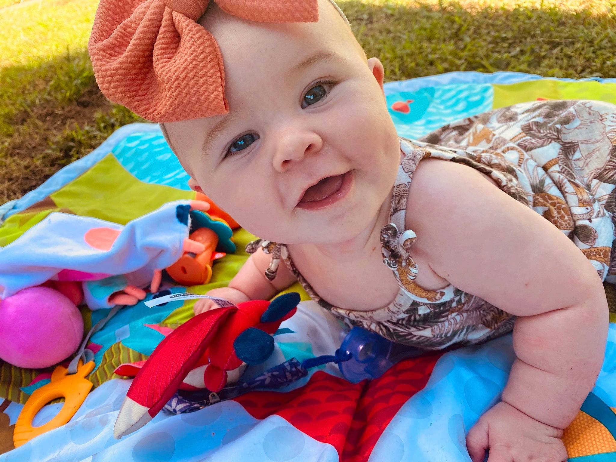 Braylee is registered to the contest to win money with this photo: baby, baby_laughing, baby_products, baby_toddler_clothing, child, event, fashion_accessory, fun, grass, happy, hat, headwear, laugh, leisure, person, pink, play, recreation, smile, summer