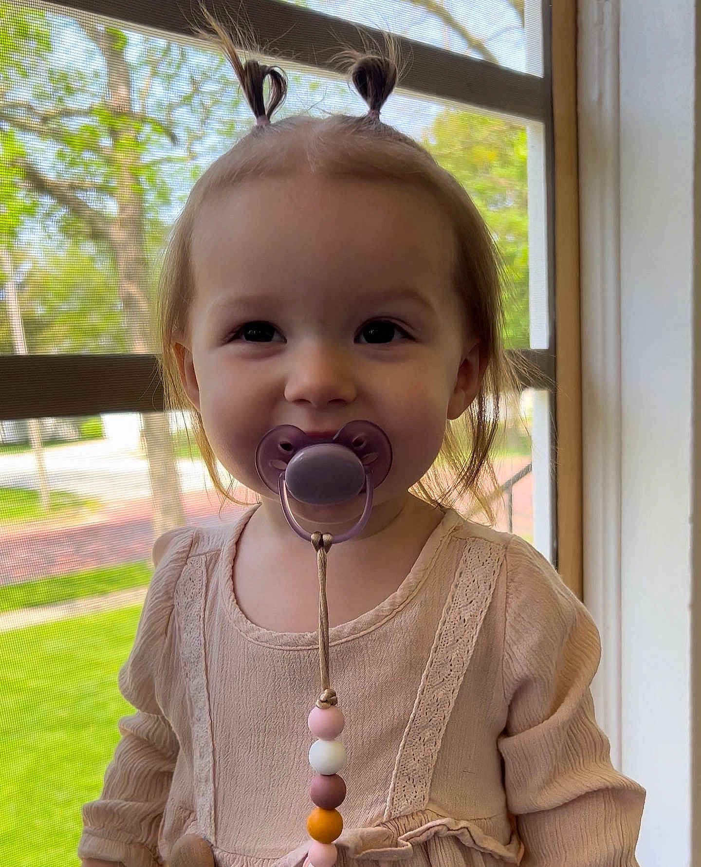 Bryar is registered to the contest to win money with this photo: arm, baby_toddler_clothing, cheek, ear, eyelash, face, finger, fun, gesture, grass, hand, happy, head, jewellery, lip, nose, person, plant, skin, toddler