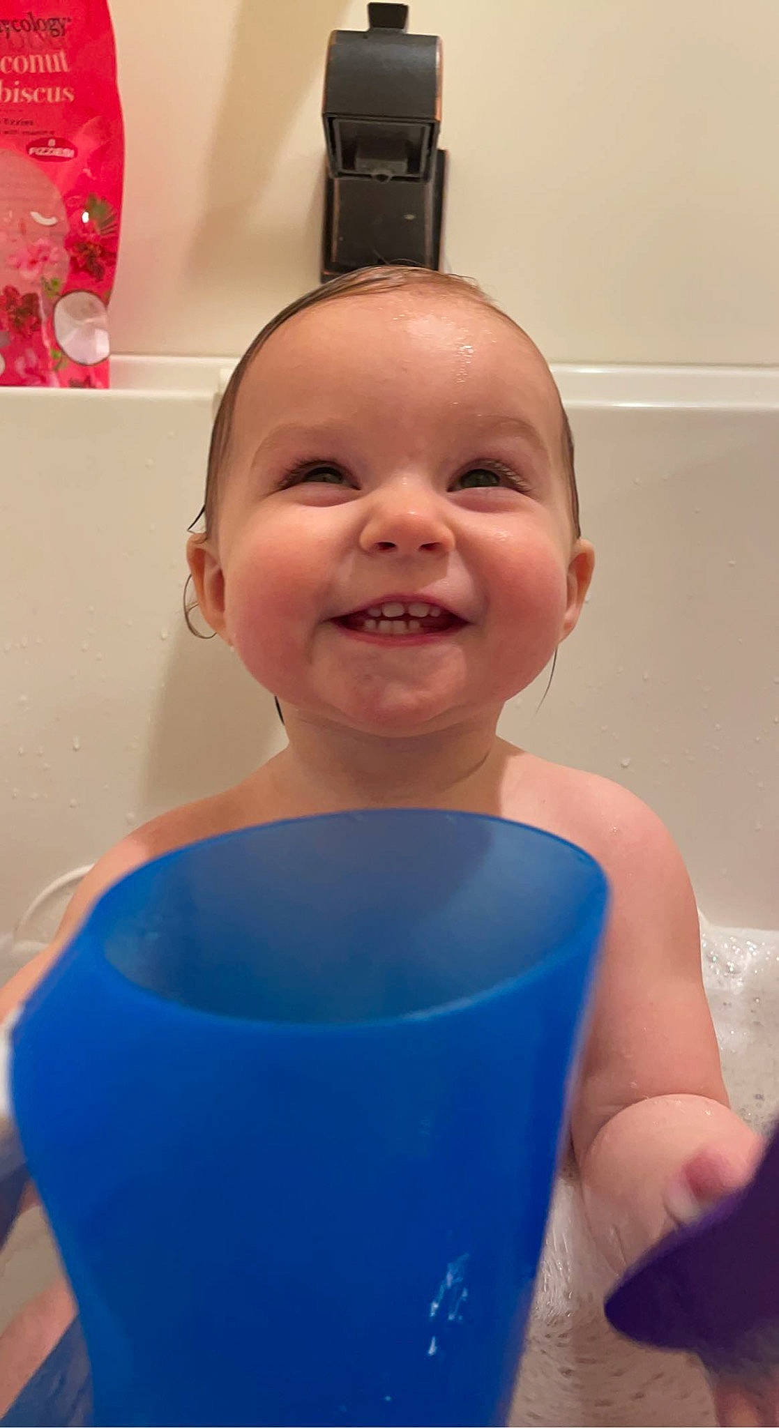 Bryar is registered to the contest to win money with this photo: baby, baby_bathing, baby_laughing, baby_products, baby_toddler_clothing, bathing, bathroom, cheek, child, drinkware, electric_blue, flooring, fun, happy, household_supply, joy, mouth, person, plastic, product