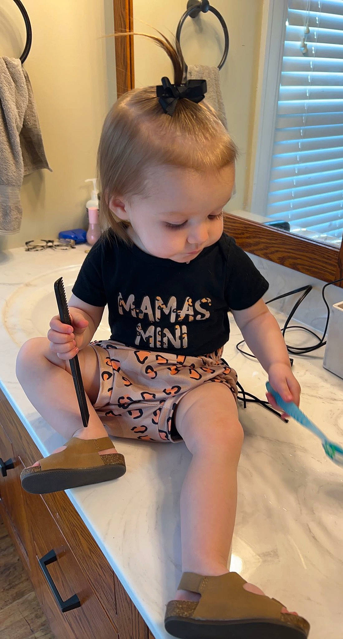 Bryar is registered to the contest to win money with this photo: baby_toddler_clothing, blond, child, elbow, eyewear, finger, flooring, fun, hairstyle, human_leg, joint, knee, person, shorts, sleeve, t_shirt, thigh, toddler, window, window_blind