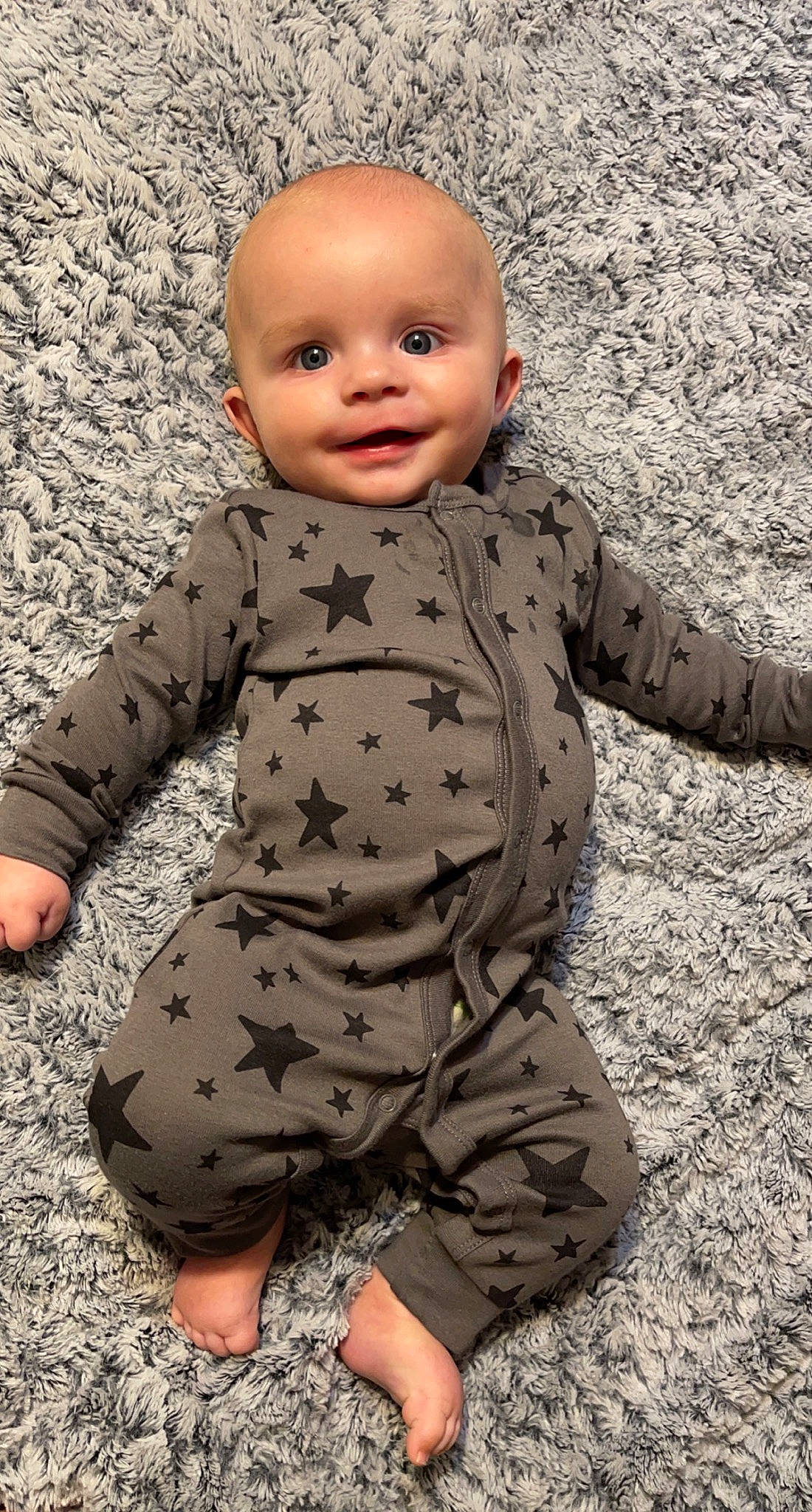 Jaxyn is registered to the contest to win money with this photo: arm, baby, baby_toddler_clothing, cheek, chin, eye, face, facial_expression, finger, gesture, head, joint, nose, people_in_nature, person, photograph, skin, sleeve, smile, standing