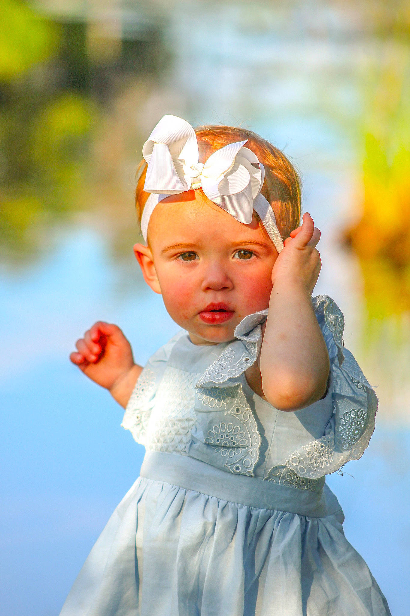 Taylor joined the competition — help win amazing prizes! baby_toddler_clothing, dress, eye, face, finger, flash_photography, fun, gesture, grass, hand, happy, headgear, headpiece, headwear, lip, people_in_nature, person, skin, sunglasses, sunlight