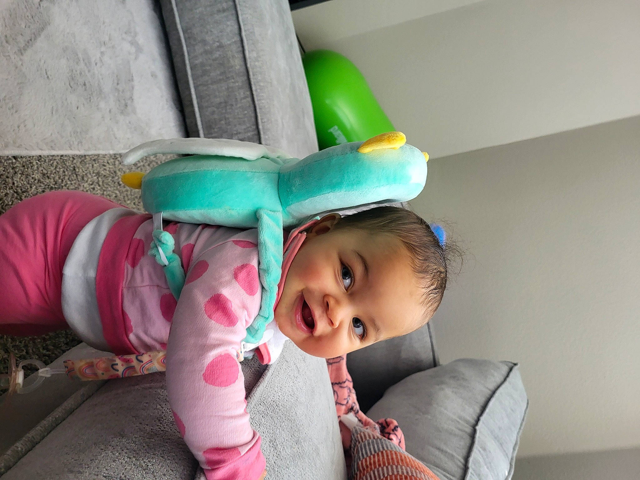 Hudsin joined the competition — help win amazing prizes! baby, baby_products, baby_toddler_clothing, chair, child, comfort, fashion_accessory, fun, happy, leisure, magenta, person, play, room, sitting, smile, sock, textile, toddler