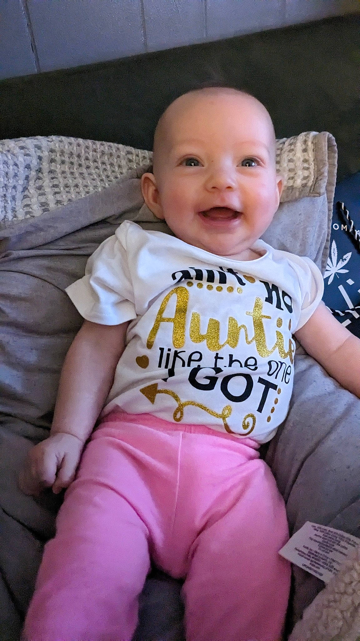 Daisy joined the competition — help win amazing prizes! baby, baby_toddler_clothing, cheek, chin, comfort, cool, face, hairstyle, happy, iris, people, person, pink, purple, skin, sleeve, smile, t_shirt, textile, thigh