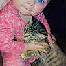 Me Me joined the competition — help win amazing prizes! baby, cat, tabby_cat, pet, animal, child, blue_eyes, pink_pajamas, cuddling, hugging, indoors, portrait, close_up, sitting, furry, whiskers, striped_fur, happy, adorable, companionship