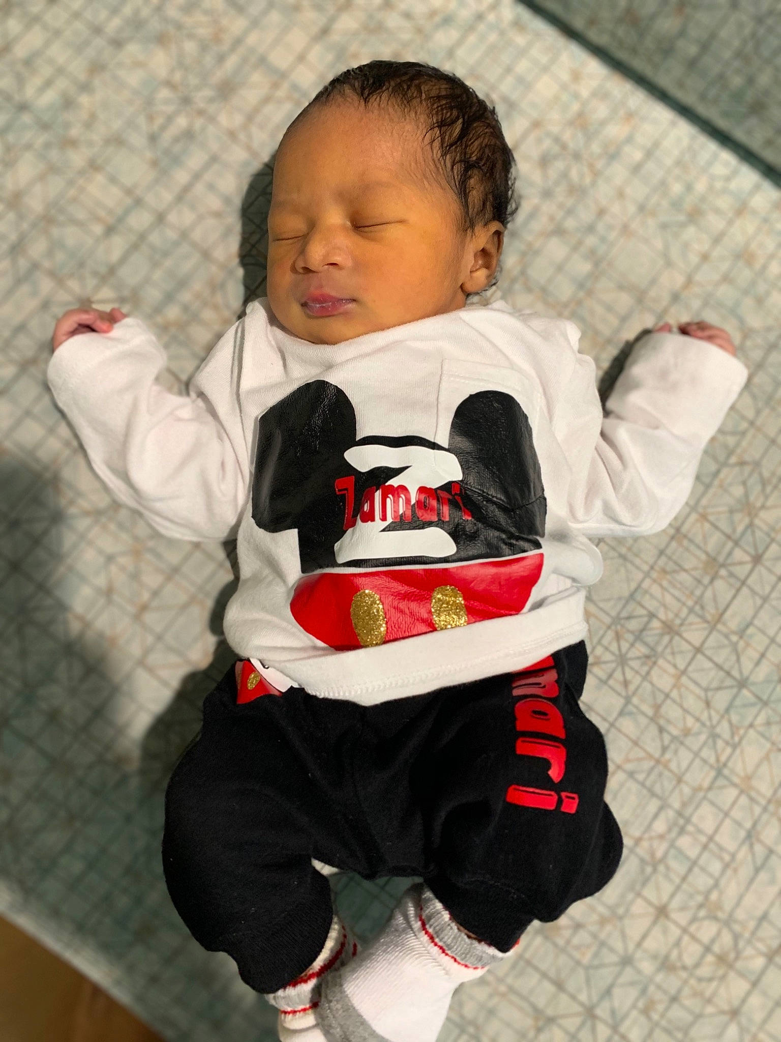 Zamari joined the competition — help win amazing prizes! baby, baby_carriage, baby_products, baby_toddler_clothing, cheek, child, clothing, comfort, facial_expression, floor, flooring, happy, head, jacket, mouth, outerwear, person, personal_protective_equipment, sleeve, t_shirt