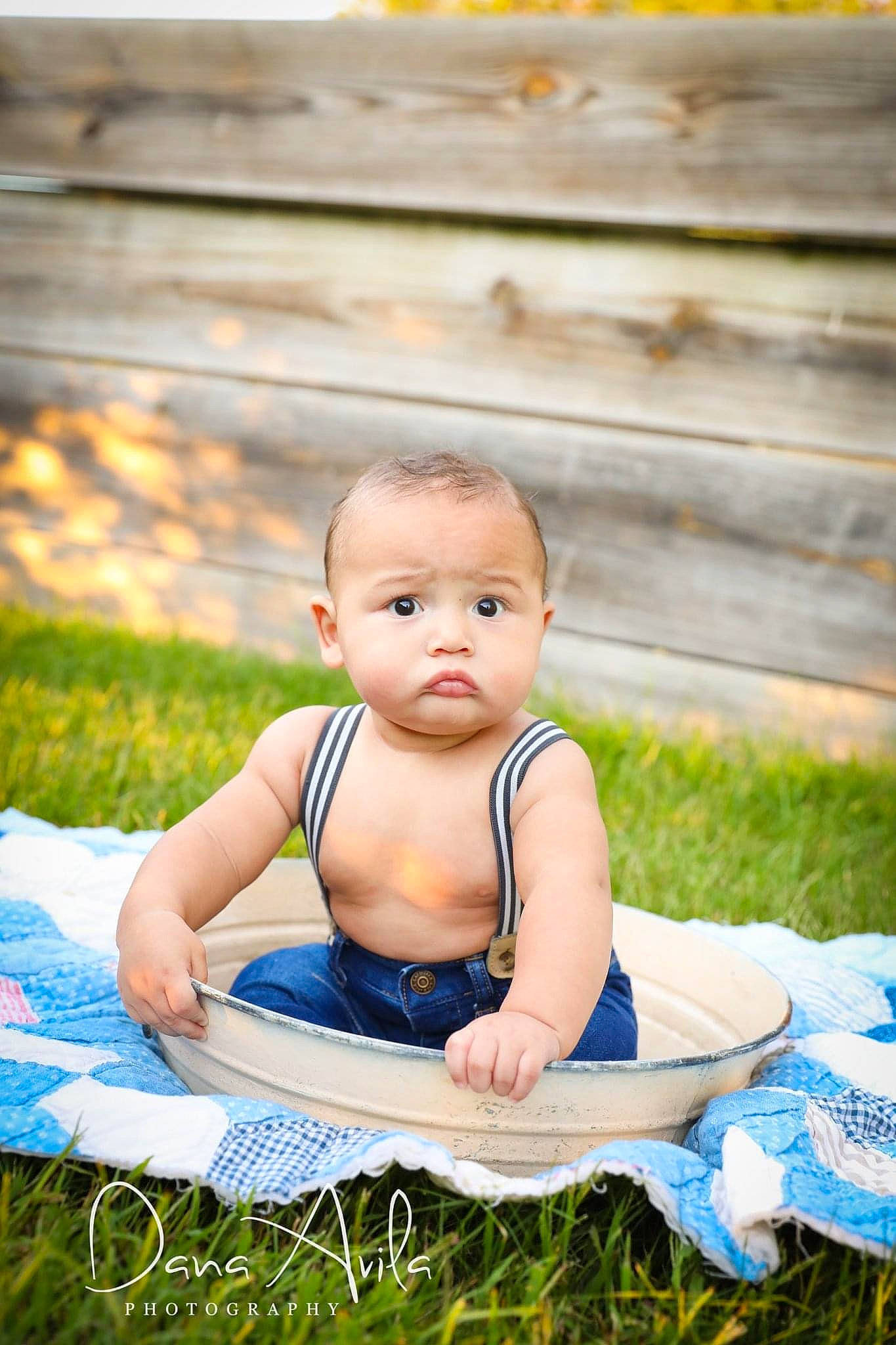 Ezra joined the competition — help win amazing prizes! azure, baby, baby_products, baby_toddler_clothing, child, electric_blue, eye, flash_photography, fun, grass, happy, leisure, people_in_nature, person, plant, recreation, sitting, toddler, tree, wood