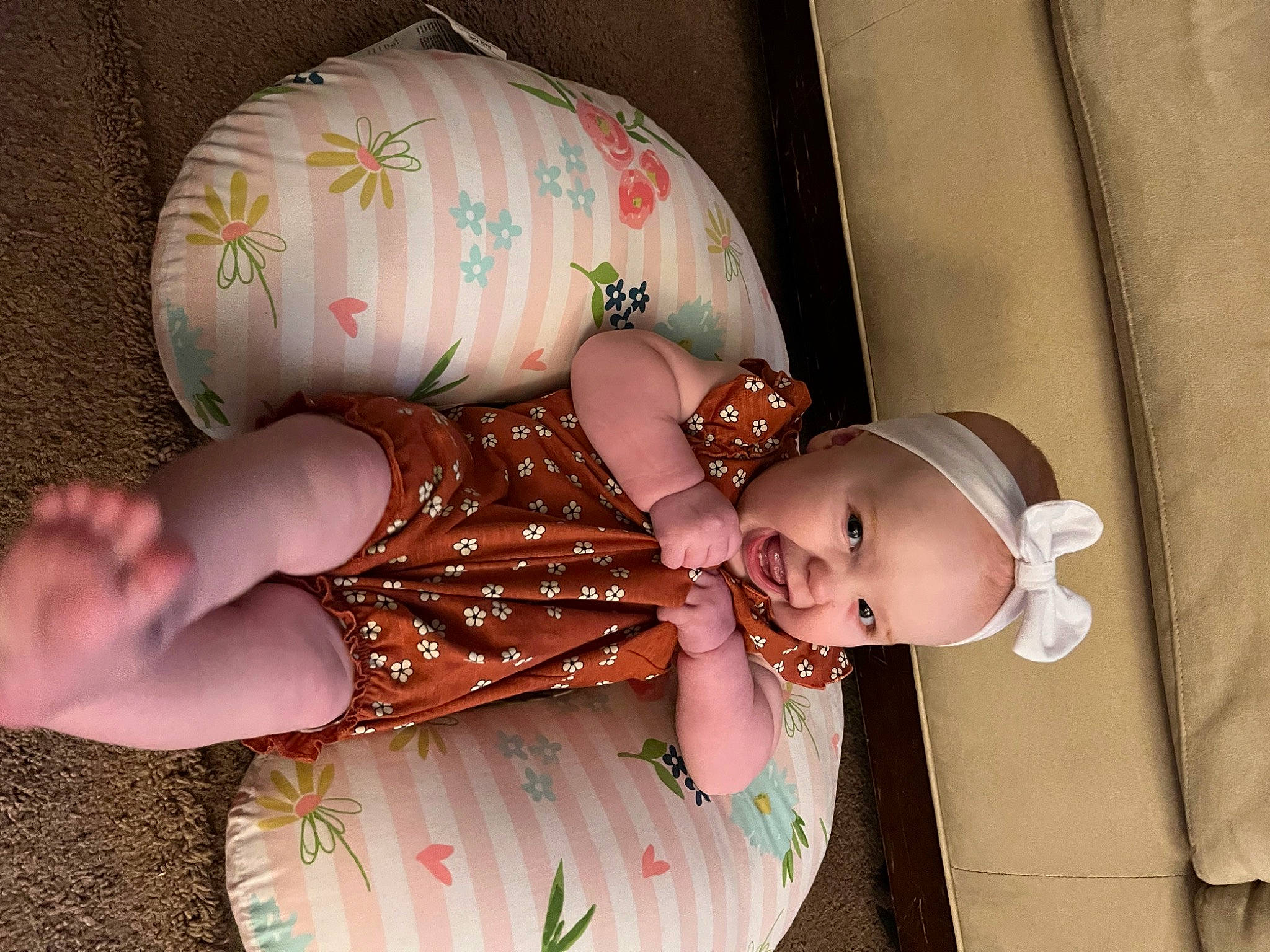 Lydia is registered to the contest to win money with this photo: abdomen, baby, baby_products, baby_toddler_clothing, cheek, chest, child, fashion_accessory, finger, hand, headgear, human_leg, nail, pattern, person, pink, skin, toddler, toy, trunk