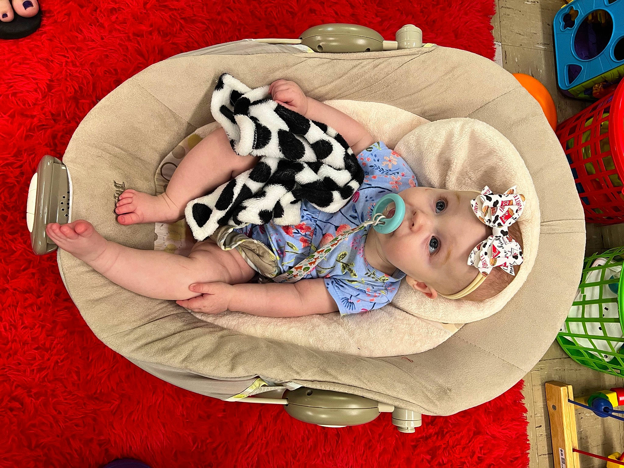 Lydia joined the competition — help win amazing prizes! baby, baby_products, baby_sleeping, baby_toddler_clothing, child, comfort, couch, fashion_accessory, happy, hat, headgear, headwear, lap, linens, pattern, person, pink, product, room, sitting