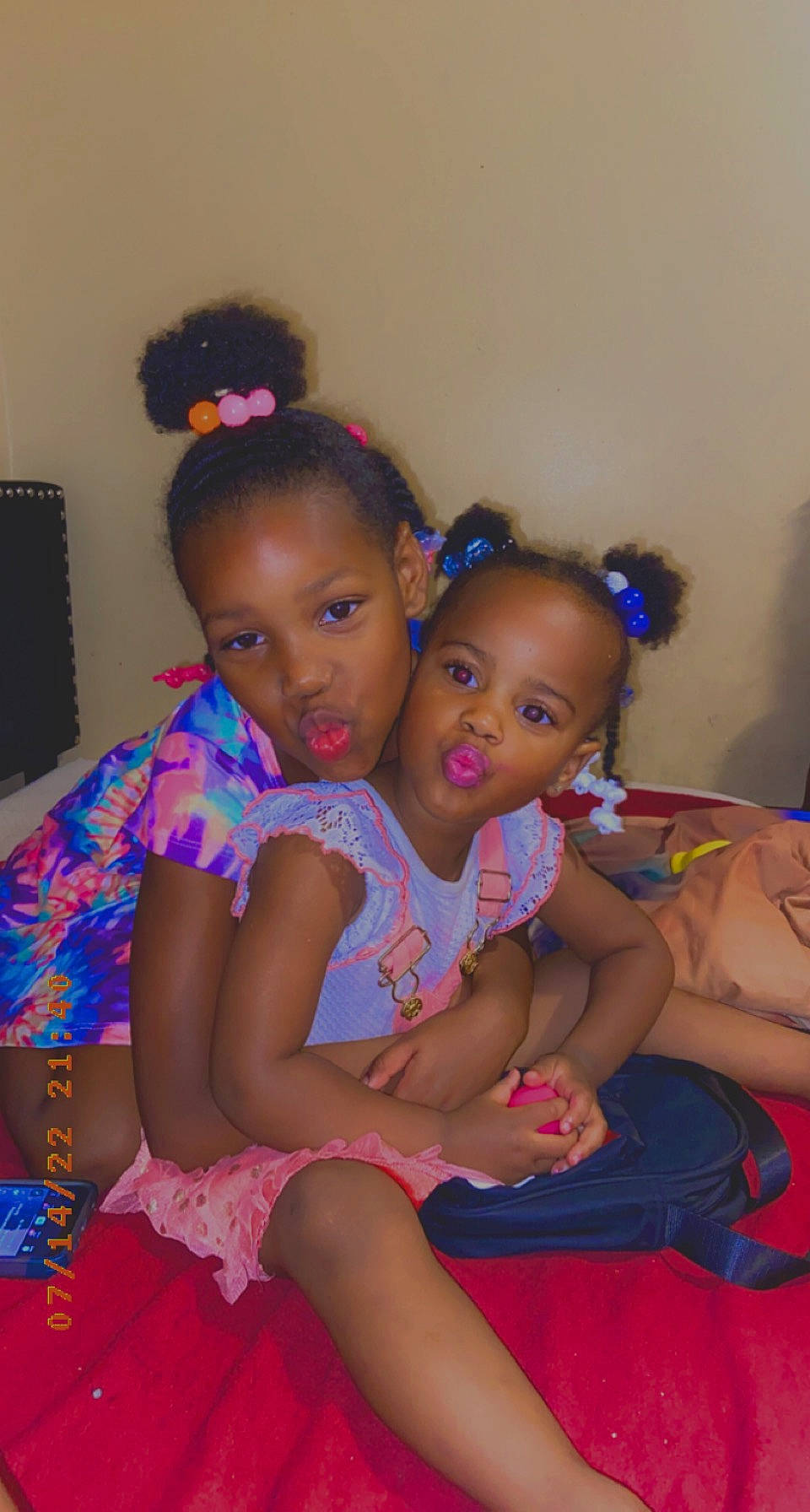 Keymora And Kamara is registered to the contest to win money with this photo: abdomen, arm, baby_toddler_clothing, cheek, event, fashion_design, flooring, fun, happy, iris, jewellery, leisure, person, pink, sharing, shoulder, skin, textile, thigh, toddler