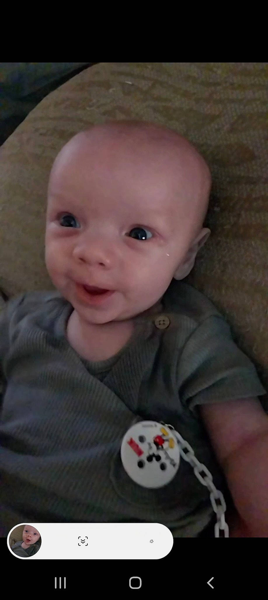 Axle is registered to the contest to win money with this photo: baby, baby_toddler_clothing, carmine, cheek, child, chin, comfort, eyebrow, fun, human_body, iris, lip, mouth, nose, organ, person, sitting, skin, sleeve, smile